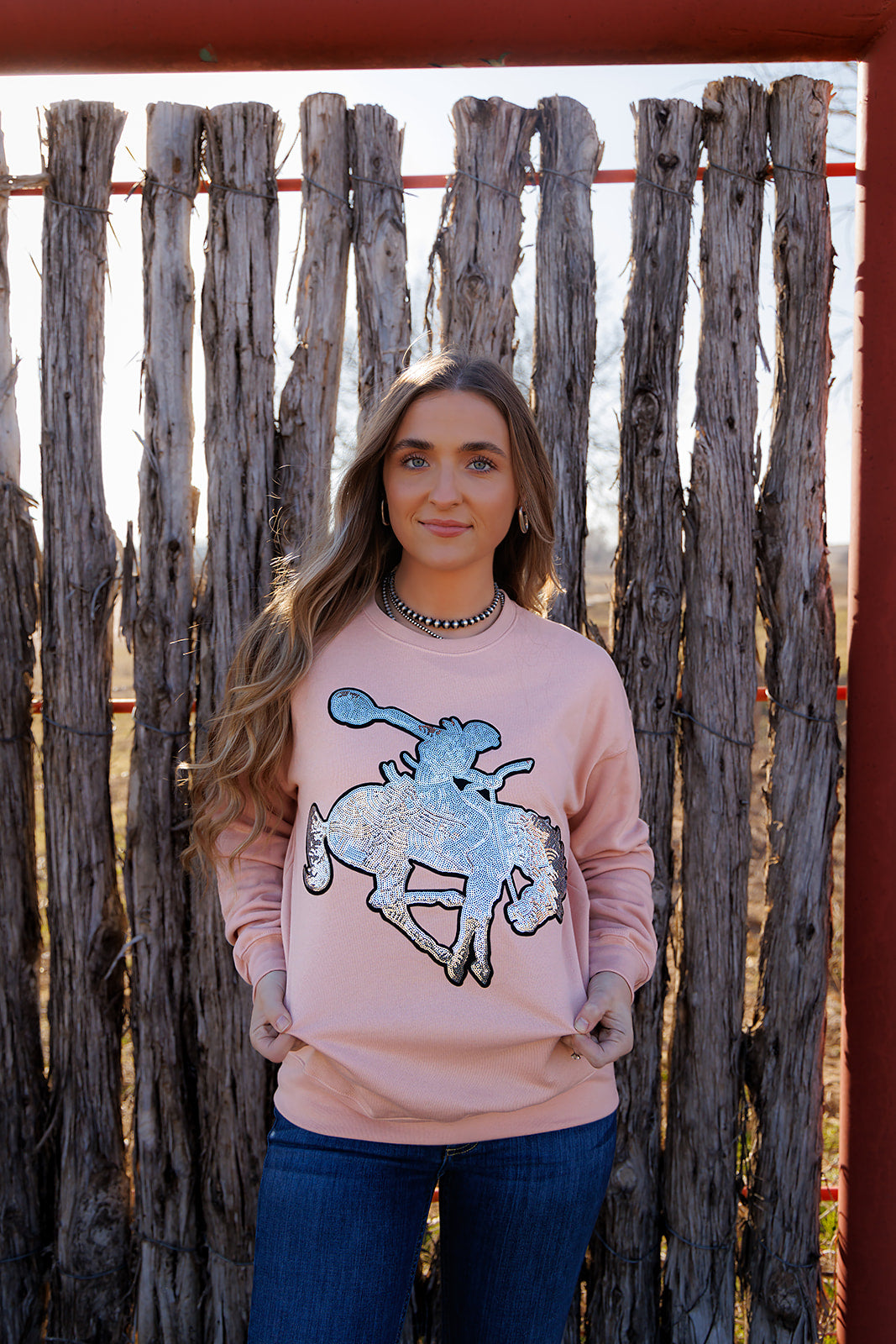 HH3945 Silver Bronc on Peach Sweatshirt